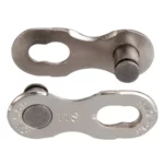 A pair of silver KMC Missing Links for X11 11-Speed
