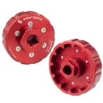 The inside and outside of a red Wolf Tooth Bottom Bracket Tool.