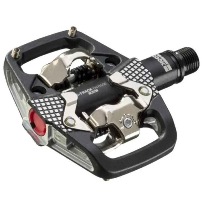 A black and silver LOOK X-TRACK EN-RAGE PLUS MTB Pedals with red bearing cover.