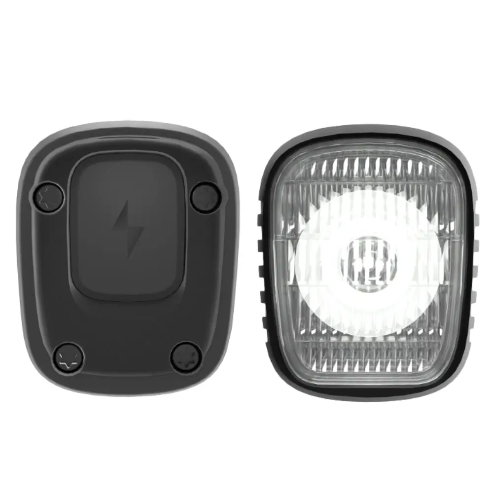 The front and back of a black Magene AT1200 Smart Bike Headlight.