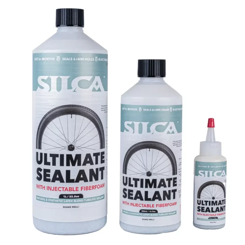 Three sizes of the Silca Ultimate Tubeless Sealant 2.0 lined up next to each other.