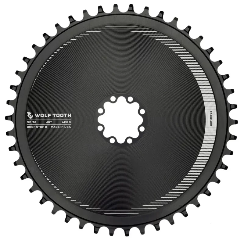 The front of a black Wolf Tooth SRAM Aero 8-Bolt Road Gravel Chainring.