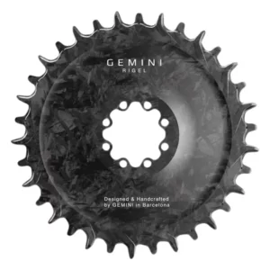 The front of a Gemini Rigel 8-Bolt MTB Chainring that shows the carbon weave.