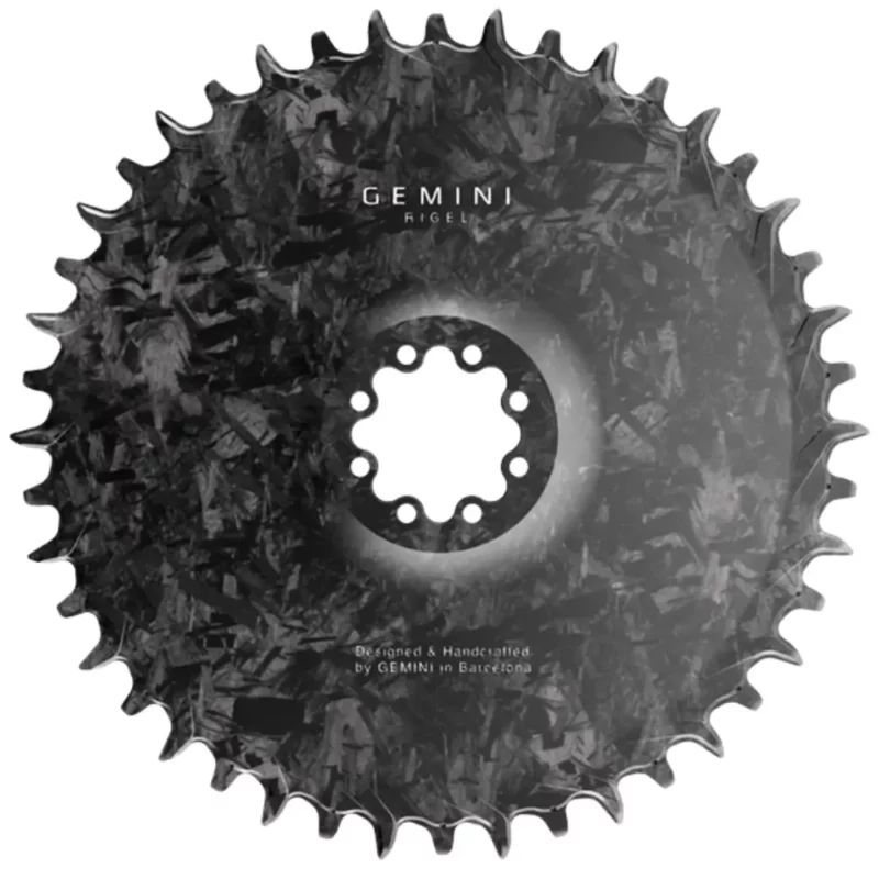 The front of a Gemini Rigel 8-Bolt Road Gravel Chainring that shows the carbon weave.