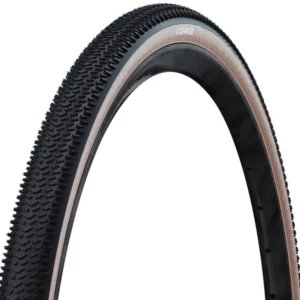A close up of the tread on a Schwalbe G-One R Gravel Tire with tan sidewall.