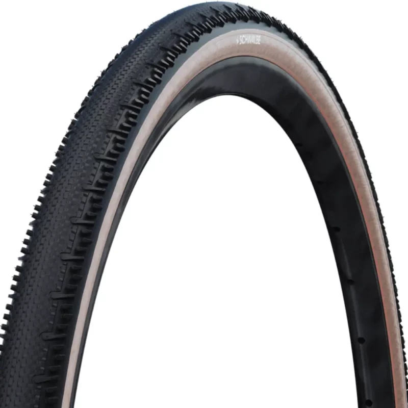 A view of the tread on a Schwalbe G-One RS Gravel Tire with tan sidewall.