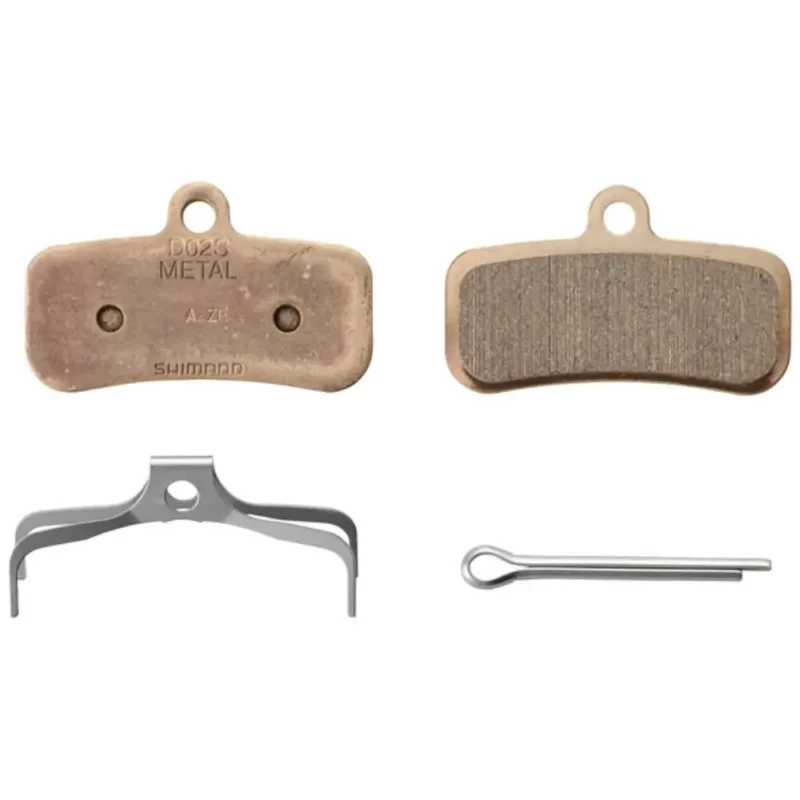 The inside, outside, spring and pin of a Shimano D02S-MX Metallic Disc Brake Pad.