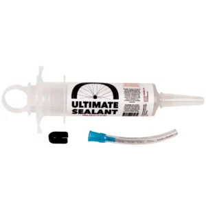 A clear Silca Ultimate Sealant Injector with hose and valve core removal tool.