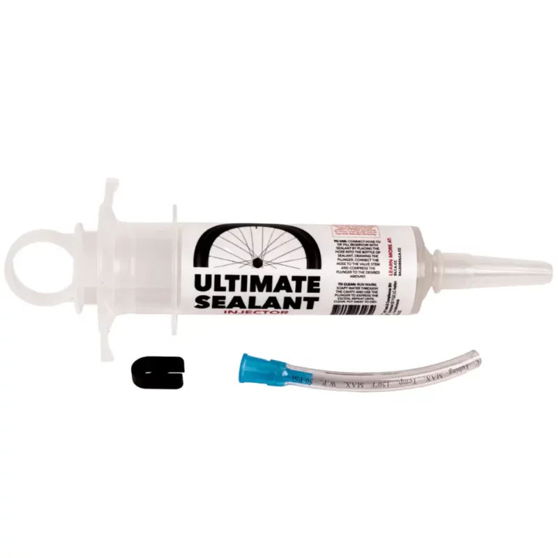 A clear Silca Ultimate Sealant Injector with hose and valve core removal tool.