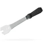 A silver PRO Team Pedal Wrench with a black handle.