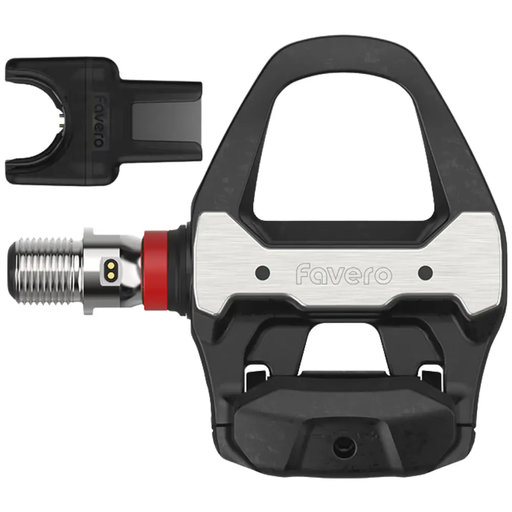 A black and silver Favero Assioma PRO RS-UP Road Upgrade Pedal with charging connector.