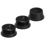 Two black Favero Assioma PRO Replacement Rings and one black replacement bushing.