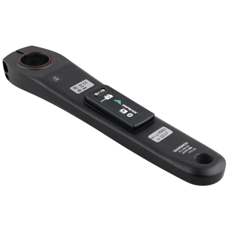 A black Shimano R8100 crank arm with an INPEAK POWERCRANK-E power meter sensor installed.