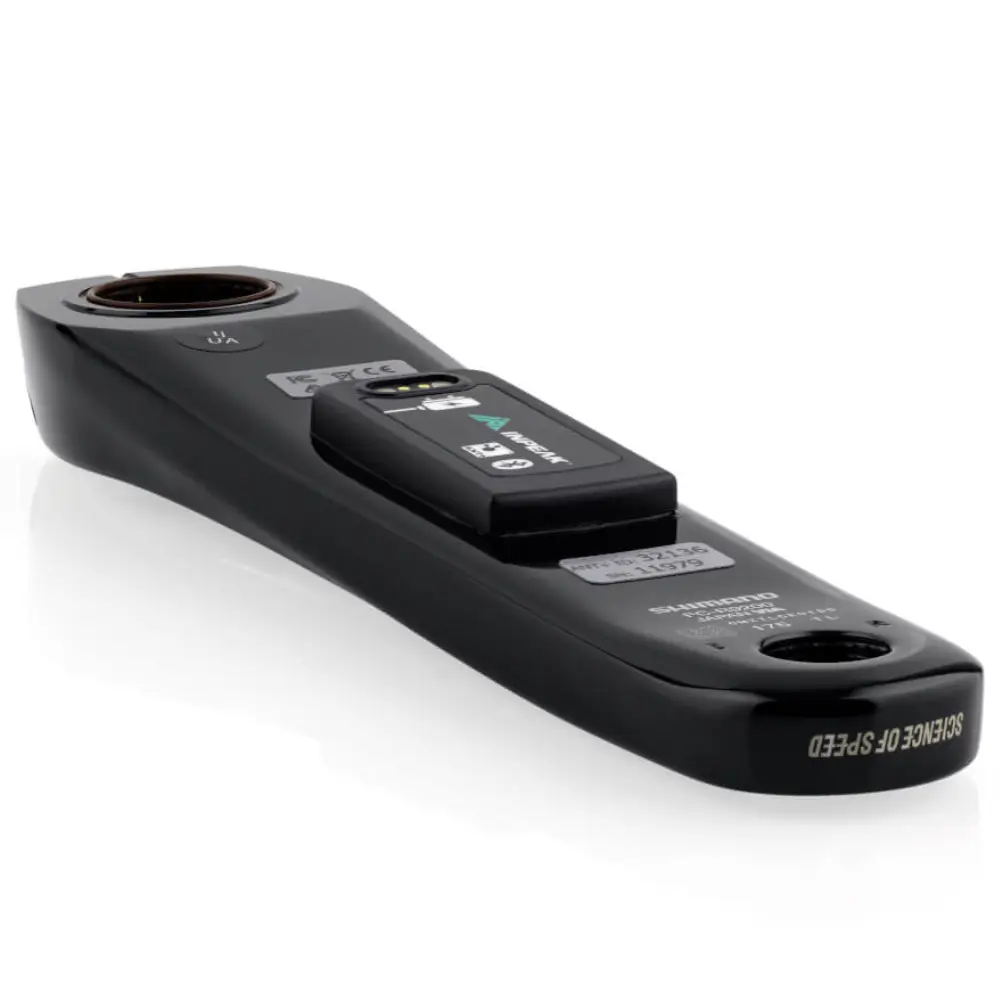 A black Shimano R9200 crank arm with an INPEAK POWERCRANK-E power meter sensor installed.
