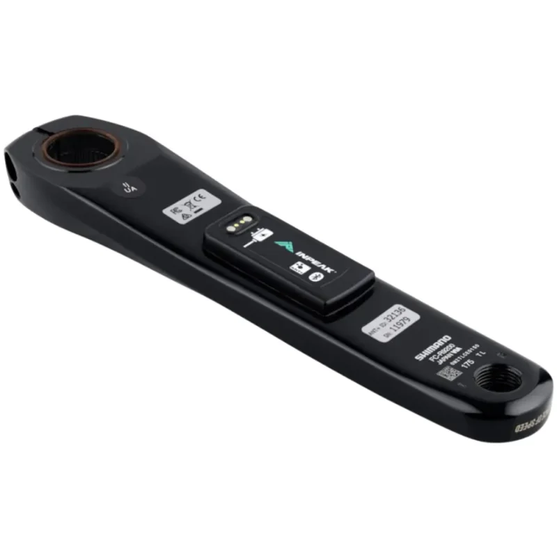 A black Shimano R9200 crank arm with an INPEAK POWERCRANK-E power meter sensor installed.
