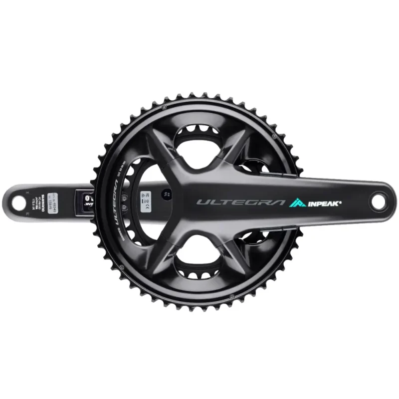 A black Shimano Ultegra R8100 crankset featuring INPEAK-POWERCRANK-E-TWiN2 sensors installed, with a teal and white INPEAK decal on the drive side crank arm.