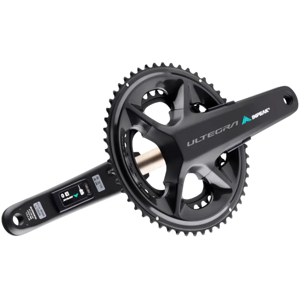 A black Shimano Ultegra R8100 crankset featuring INPEAK-POWERCRANK-E-TWiN2 sensors installed, with a teal and white INPEAK decal on the drive side crank arm.