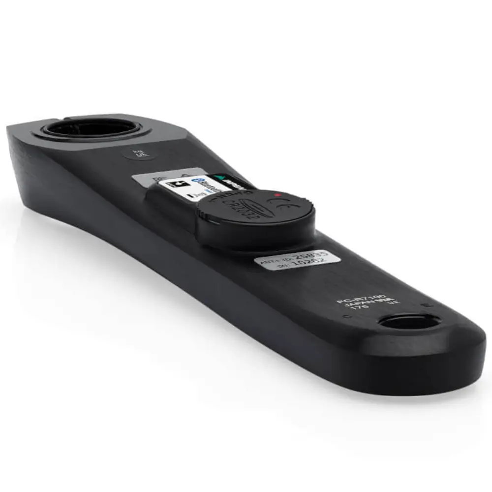 A black Shimano R7100 crank arm with an INPEAK POWERCRANK power meter sensor installed.