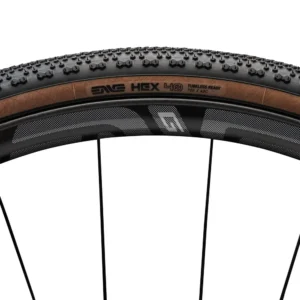 A tan ENVE Hex Gravel Tire installed on a bicycle wheel