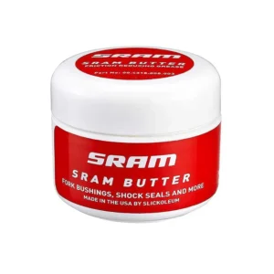 A 1oz white and red tub of SRAM Butter Grease