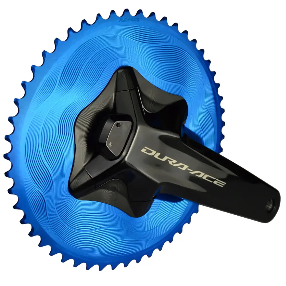 A black ALUGEAR Aero Cover for Shimano R9200-P Power Meter Cranksets installed on a Dura-Ace power meter crankset and blue ALUGEAR chainring