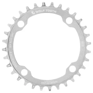 A Wolf Tooth Components 1x 104 BCD MTB Chainring in Raw Silver