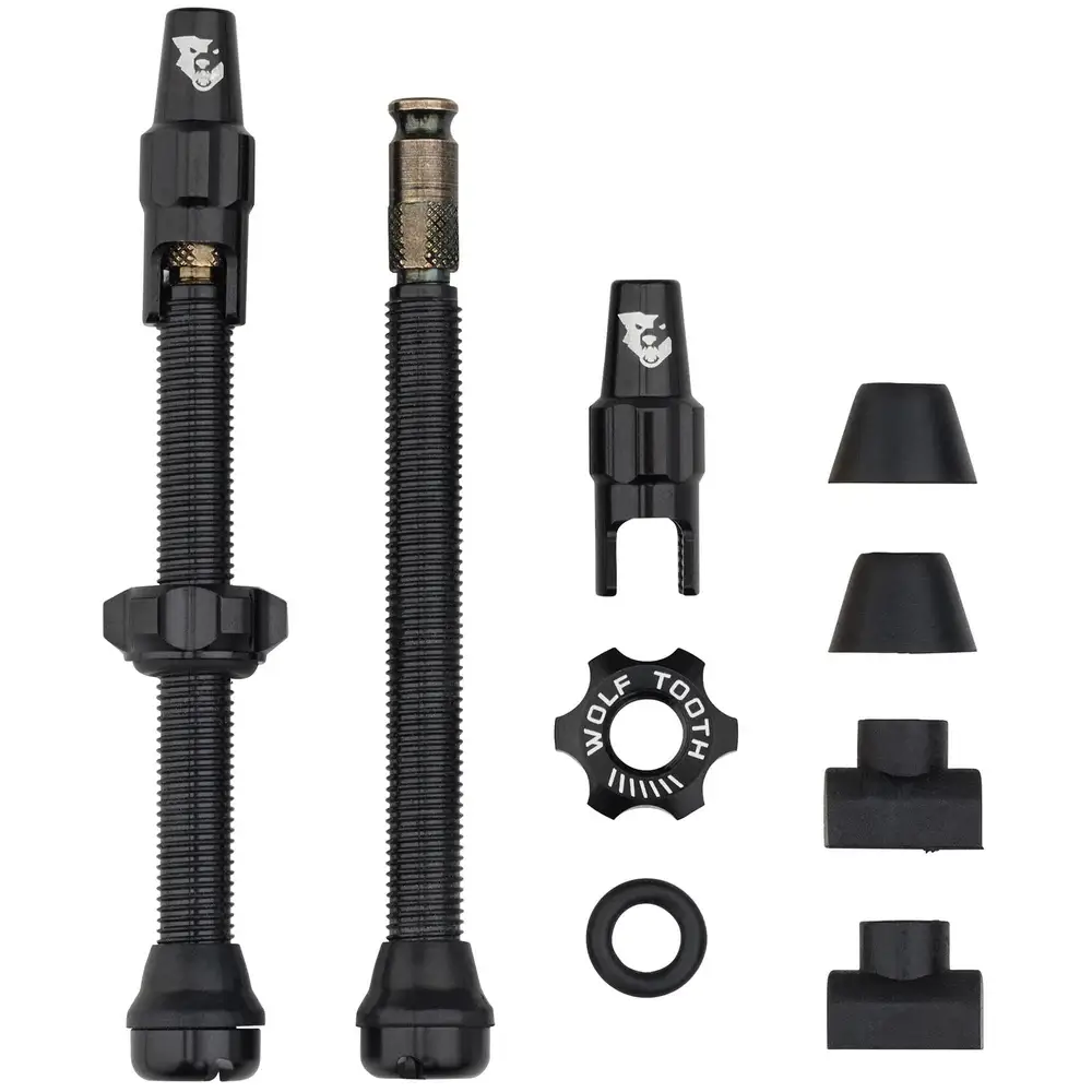 A black Wolf Tooth Tubeless Clik Valve Kit with 60 mm valve stems.