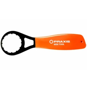 A Praxis M30 Wrench Tool with orange handle
