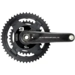 Campagnolo road bicycle crankset with SRM power meter spider, dual chainrings, black finish, and integrated electronics, shown on a white background.