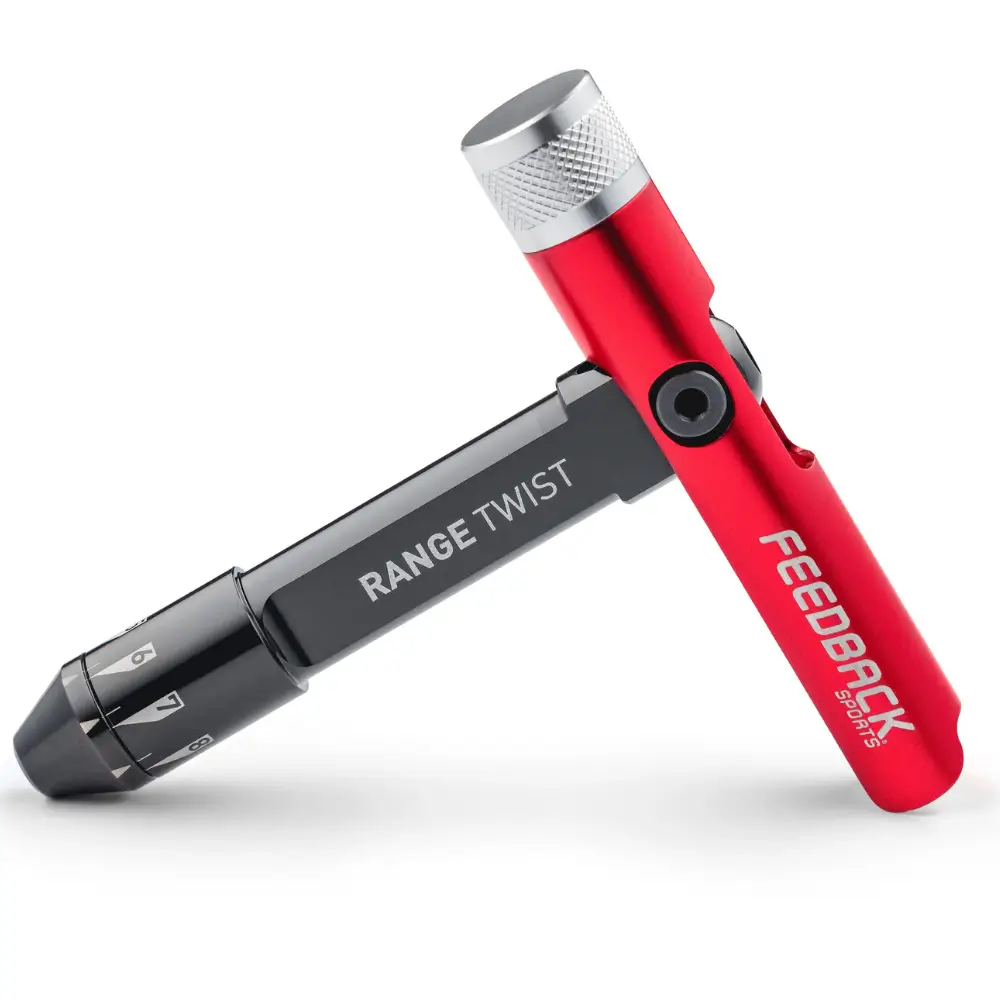 A black and red Feedback Sports Range Twist Torque Wrench from the side