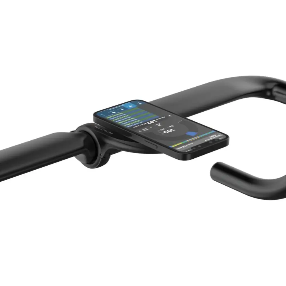 A black KOM Cycling Phone Mount Bundle installed on a black handlebar showing a phone attached