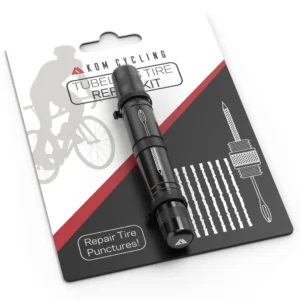 A black KOM Cycling Tubeless Tire Repair Tool