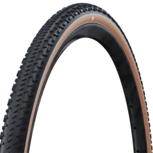 A transparent sidewall Schwalbe G-One RX PRO Gravel Tire showing the tread