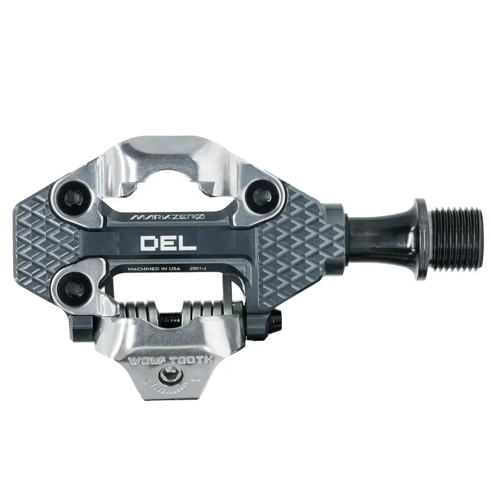A grey Wolf Tooth MK0 DEL MTB/Gravel Pedals